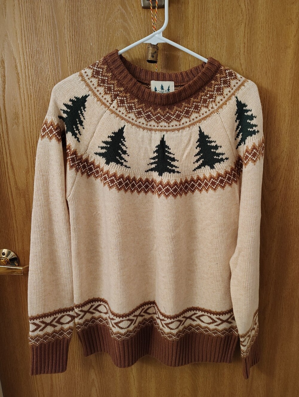 Kiel James Patrick Cream Sweater with Brown Trim and Dark Green Tree Motif